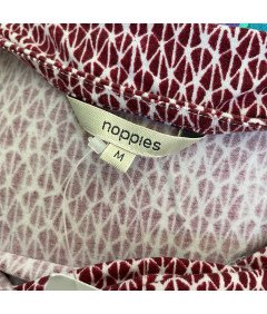 Noppies Predkolenska obleka Elegantna udobna rdeča velikost M